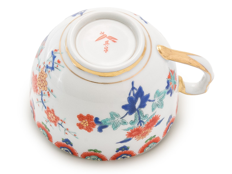 Arita-yaki tea cup and saucer, plum trees and chrysanthemum, Kisen 